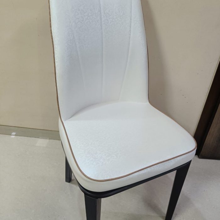 Elegant White Upholstered Dining Chair with Subtle Floral Texture & Dark Wood Legs